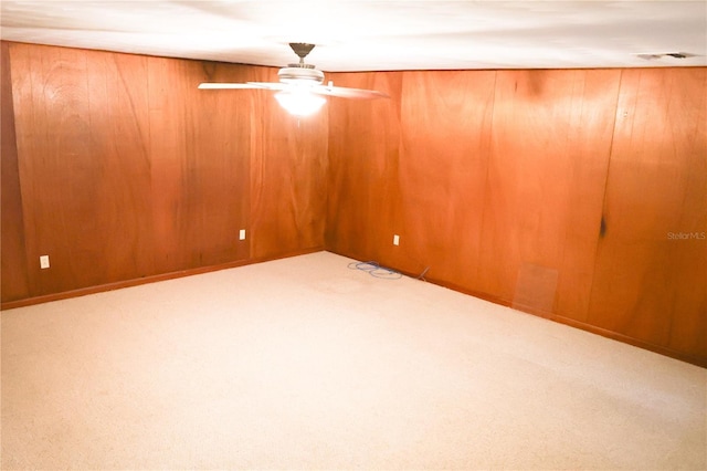 111 Deen Blvd, Auburndale, FL 33823 - spare room featuring ceiling fan, carpet flooring, and wooden walls