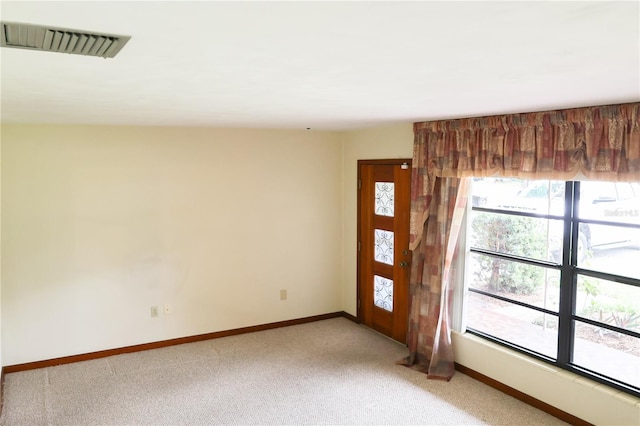 111 Deen Blvd, Auburndale, FL 33823 - foyer entrance with baseboards and light colored carpet