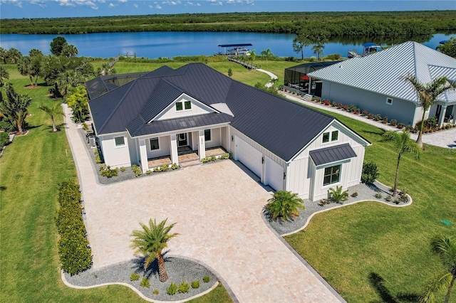 aerial view featuring a water view