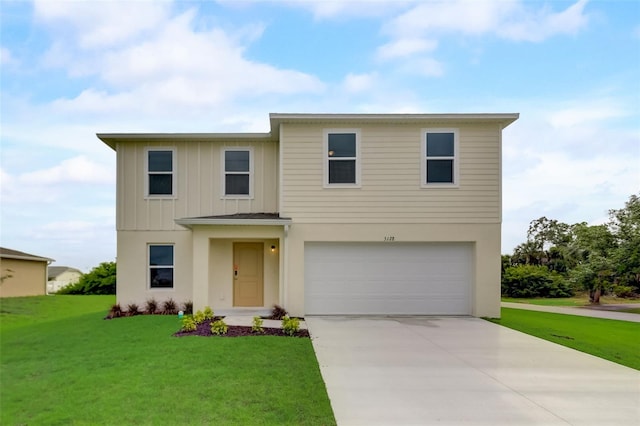 view of front of house with a garage and a front yard