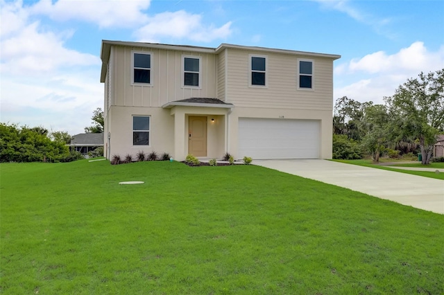 view of front of property with a garage and a front yard