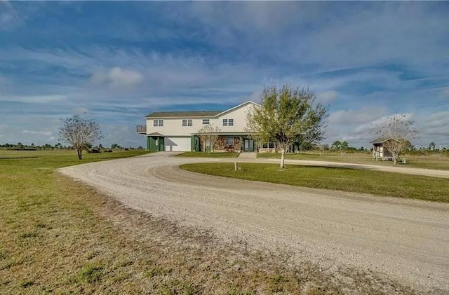 view of front of property with a front lawn