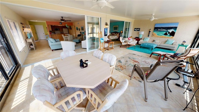 interior space featuring ceiling fan