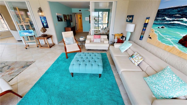 living room with tile patterned flooring