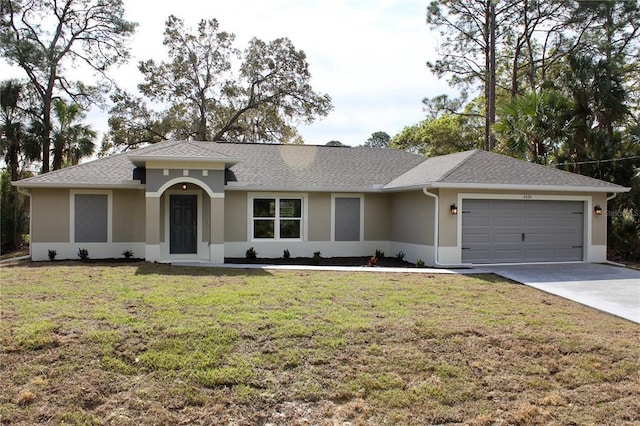 ranch-style house with a front lawn and a garage