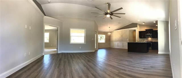 unfurnished living room featuring dark wood-type flooring, ceiling fan, and vaulted ceiling