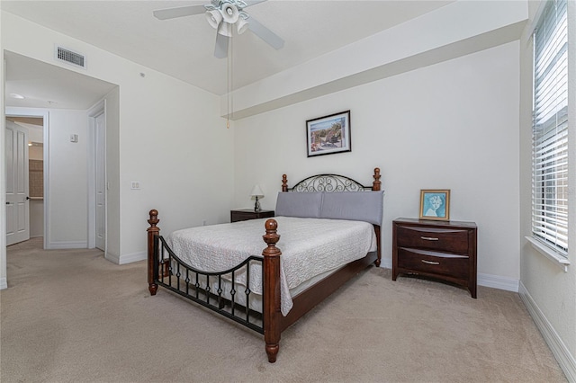 bedroom featuring ceiling fan and light colored carpet