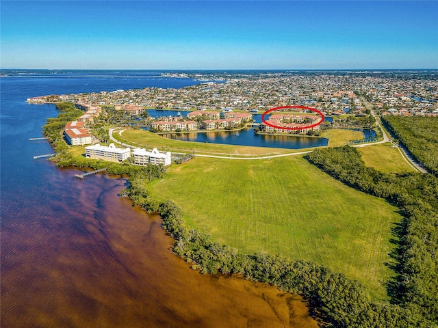 bird's eye view with a water view