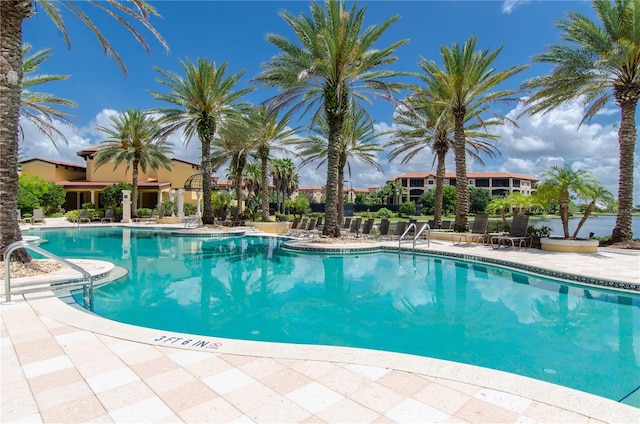 view of pool featuring a patio