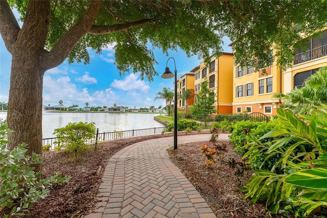 view of home's community with a water view