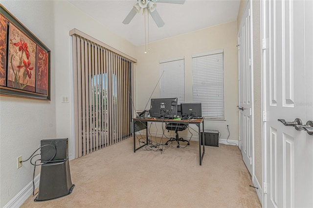 carpeted office with ceiling fan