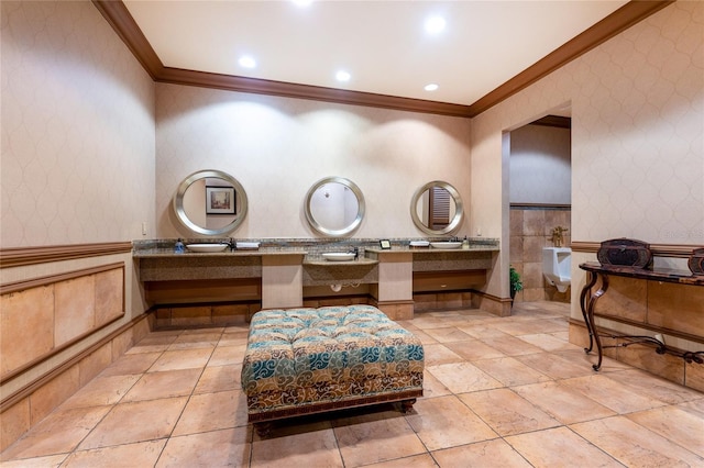 bathroom featuring ornamental molding, vanity, and tile flooring