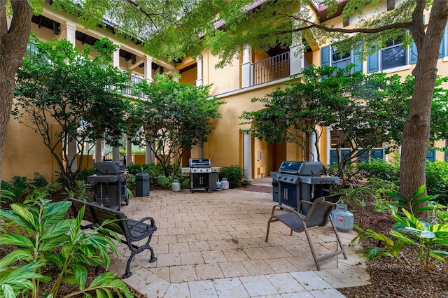 view of patio with a grill