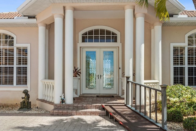 doorway to property with french doors