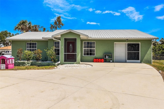 ranch-style house with a garage