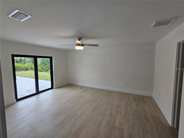 8285 Agate St, Port Charlotte, FL 33981 - spare room with light wood-type flooring, a ceiling fan, and baseboards