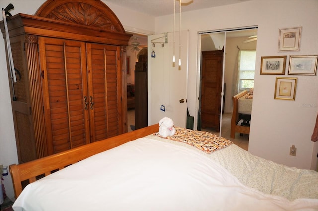 bedroom featuring a closet and tile flooring