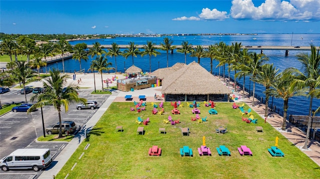 birds eye view of property featuring a water view