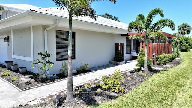 view of property exterior featuring a yard