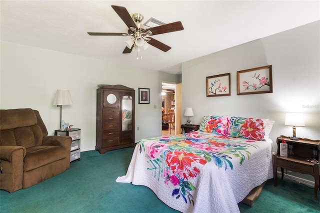 bedroom with dark carpet and ceiling fan