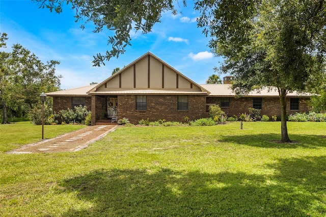 view of front of house with a front lawn