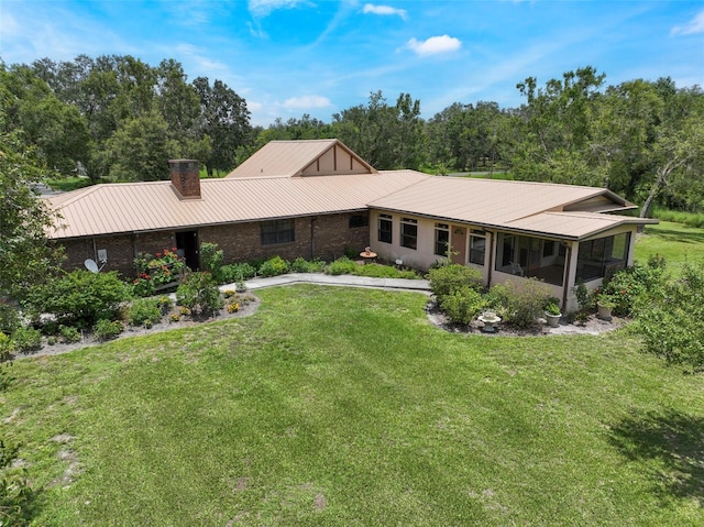 ranch-style house featuring a front yard