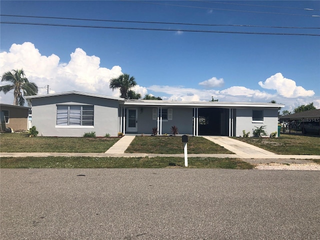 view of front facade with a front yard and a porch