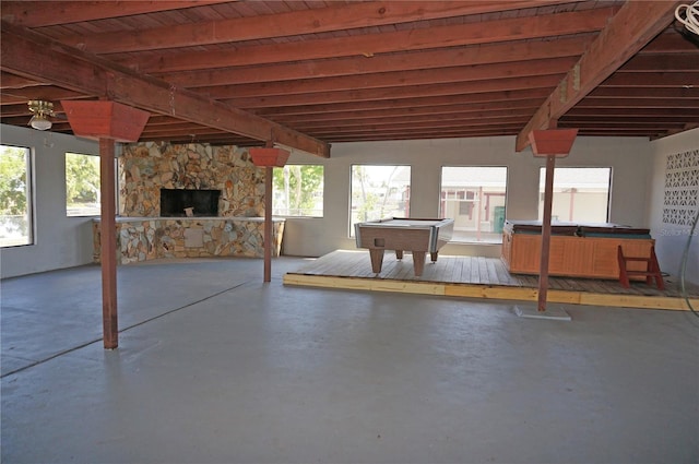 interior space with a stone fireplace