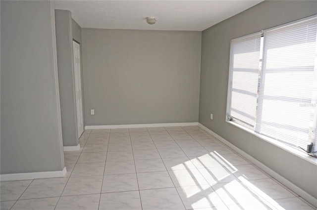 view of tiled spare room