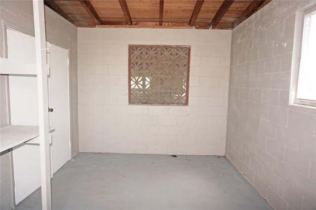 basement featuring wood ceiling