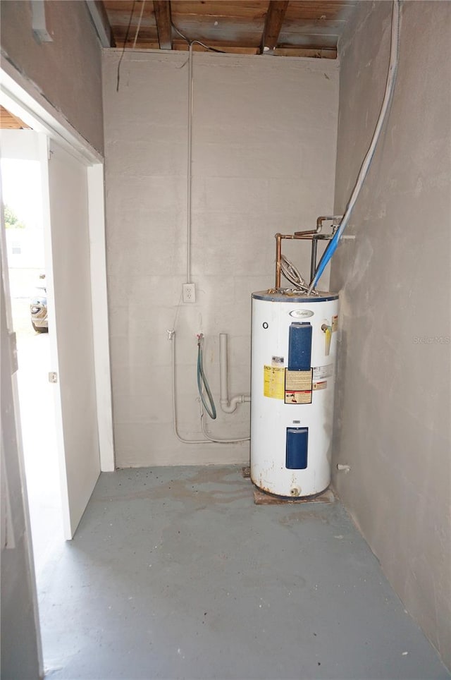 utility room with water heater