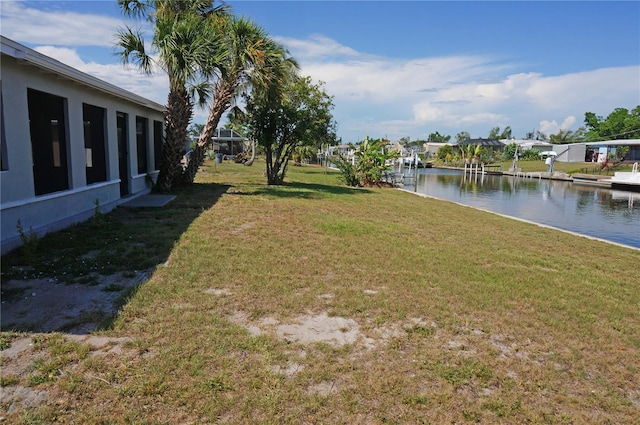 view of yard with a water view