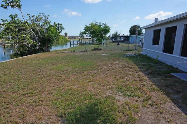 view of yard with a water view