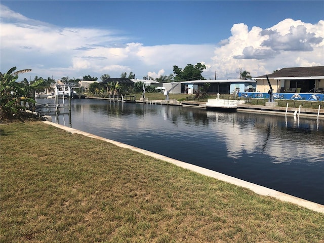 property view of water featuring a boat dock