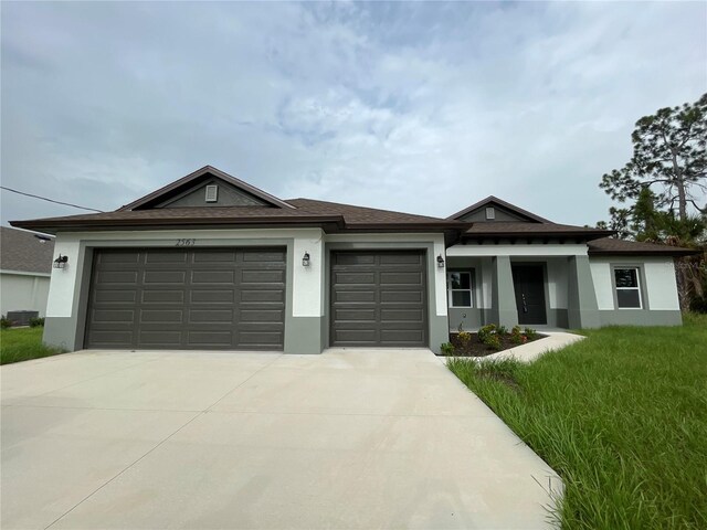 view of front of property with a garage