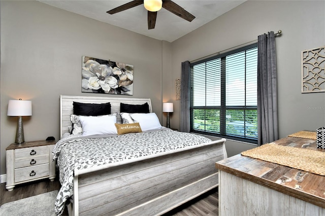 bedroom featuring dark hardwood / wood-style floors and ceiling fan