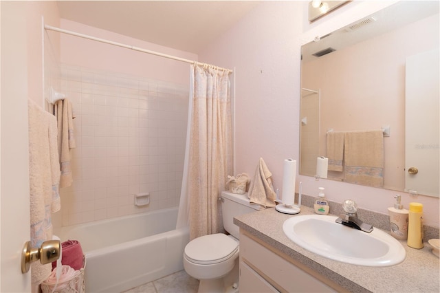 full bathroom featuring toilet, tile patterned floors, shower / bath combo, and vanity