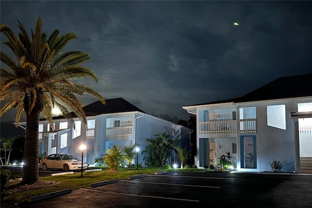 view of front of home with a balcony