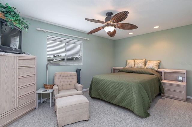 carpeted bedroom featuring ceiling fan