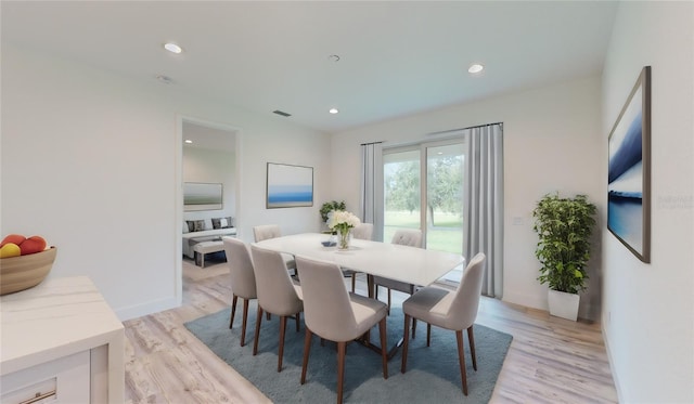 dining area with light wood-type flooring