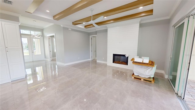 unfurnished room featuring a large fireplace, ceiling fan with notable chandelier, ornamental molding, and beamed ceiling