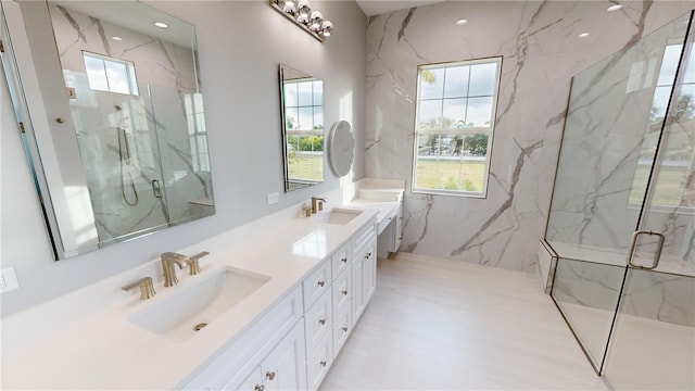 bathroom featuring vanity and walk in shower