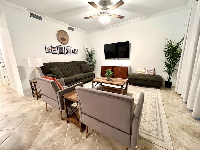 living room with ornamental molding, light tile flooring, and ceiling fan