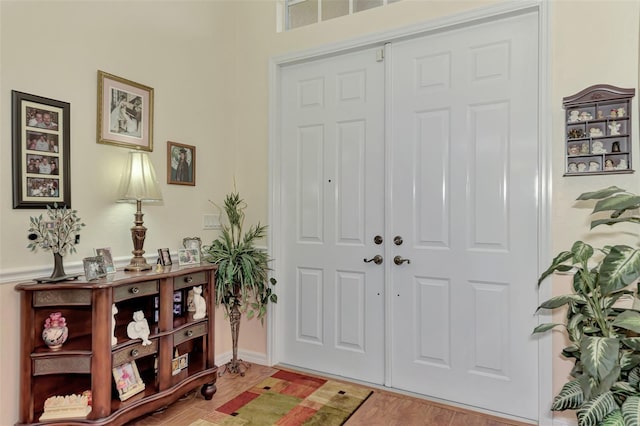 entryway with light hardwood / wood-style floors