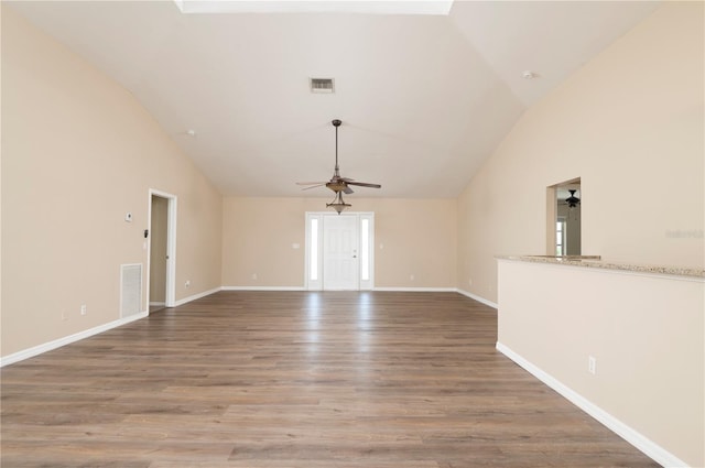 unfurnished room featuring high vaulted ceiling, ceiling fan, and light hardwood / wood-style flooring