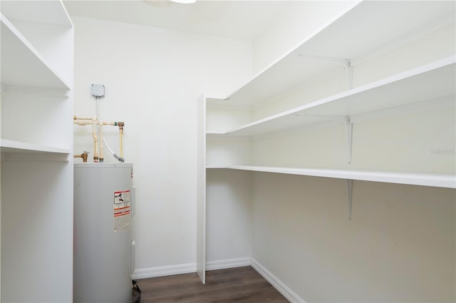 utility room with electric water heater