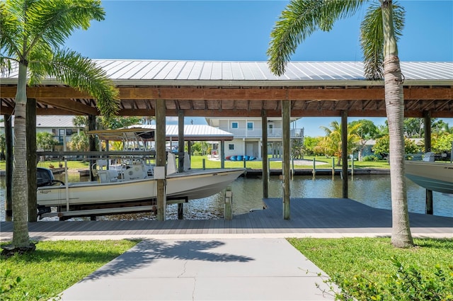 dock area featuring a water view