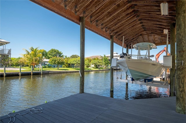 dock area with a water view