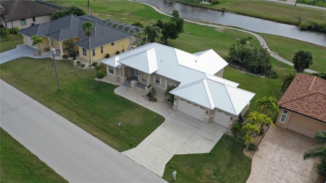 drone / aerial view featuring a water view