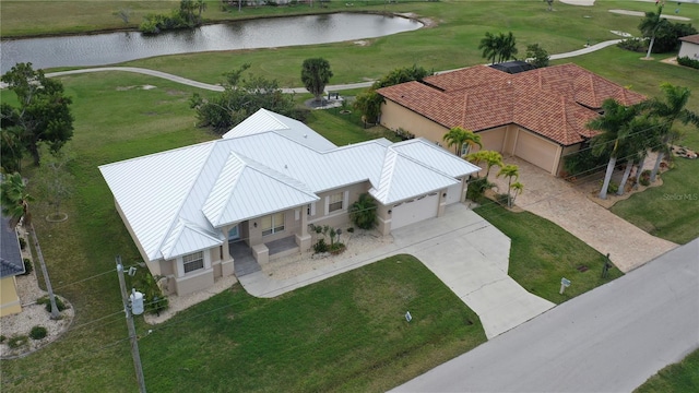 drone / aerial view with a water view